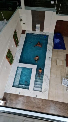 Casa aconchegante com piscina